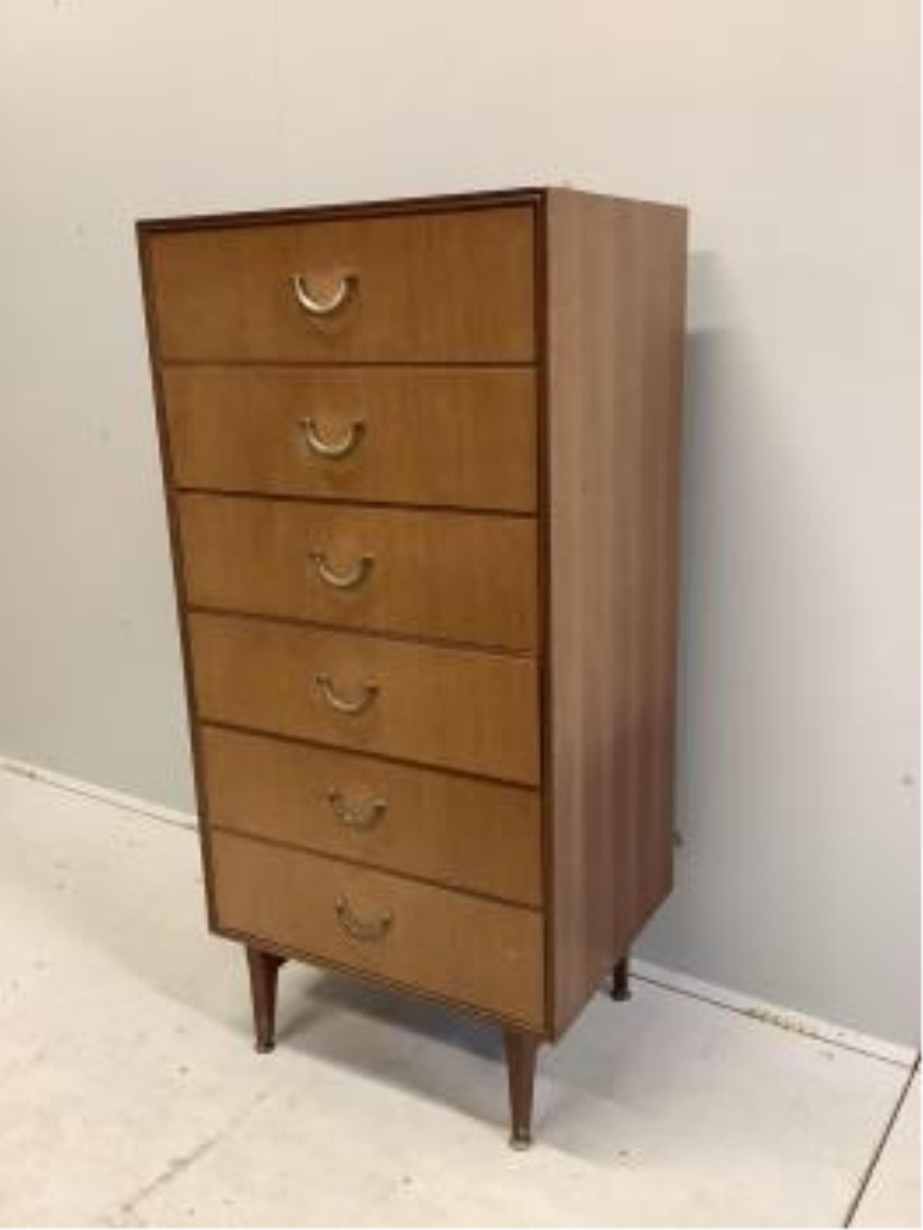 A mid century Meredew teak concave dressing table, width 162cm, depth 54cm, height 126cm, together with a stool and six drawer chest. Condition - poor to fair